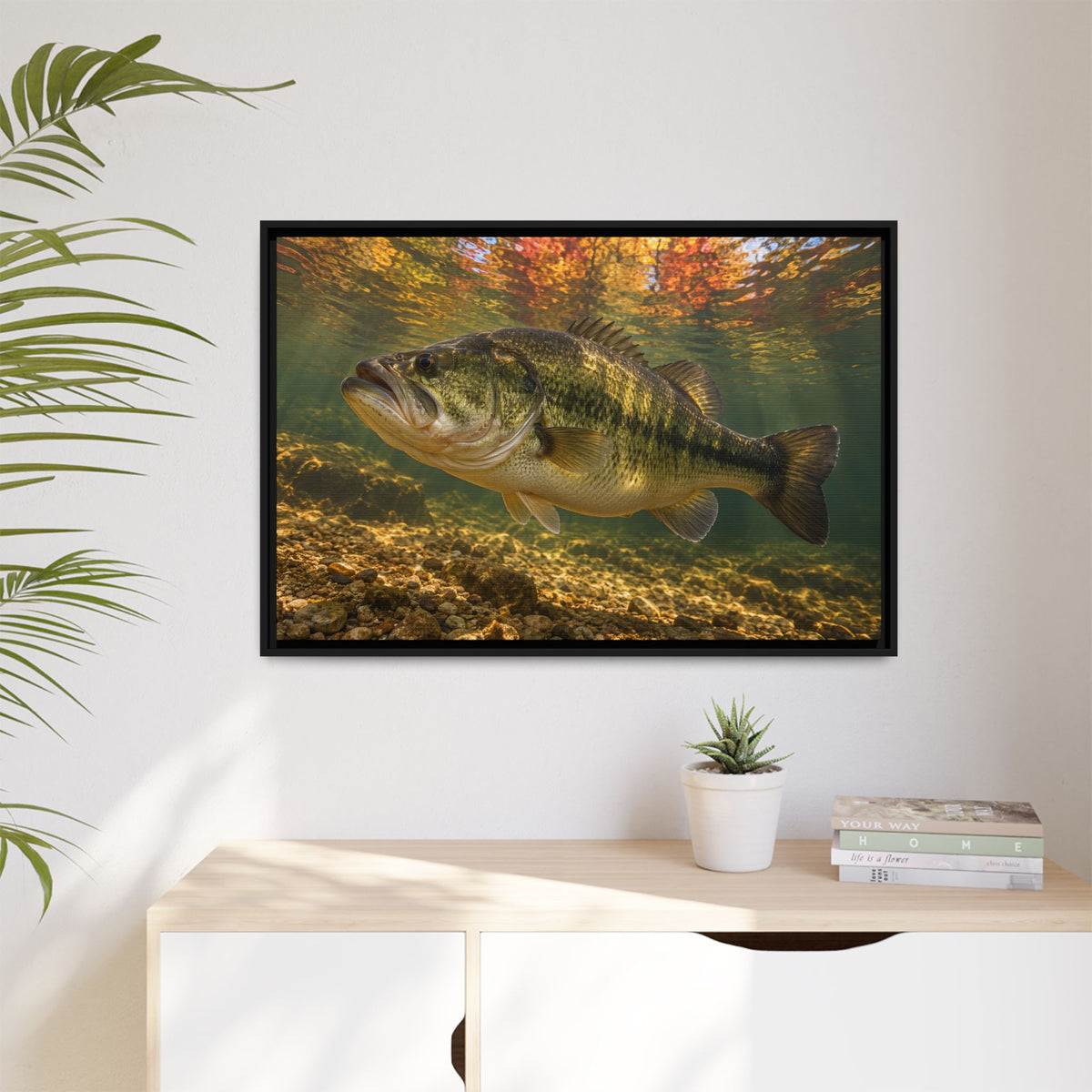 Golden Autumn Reflection Largemouth Bass framed canvas hanging in a living room