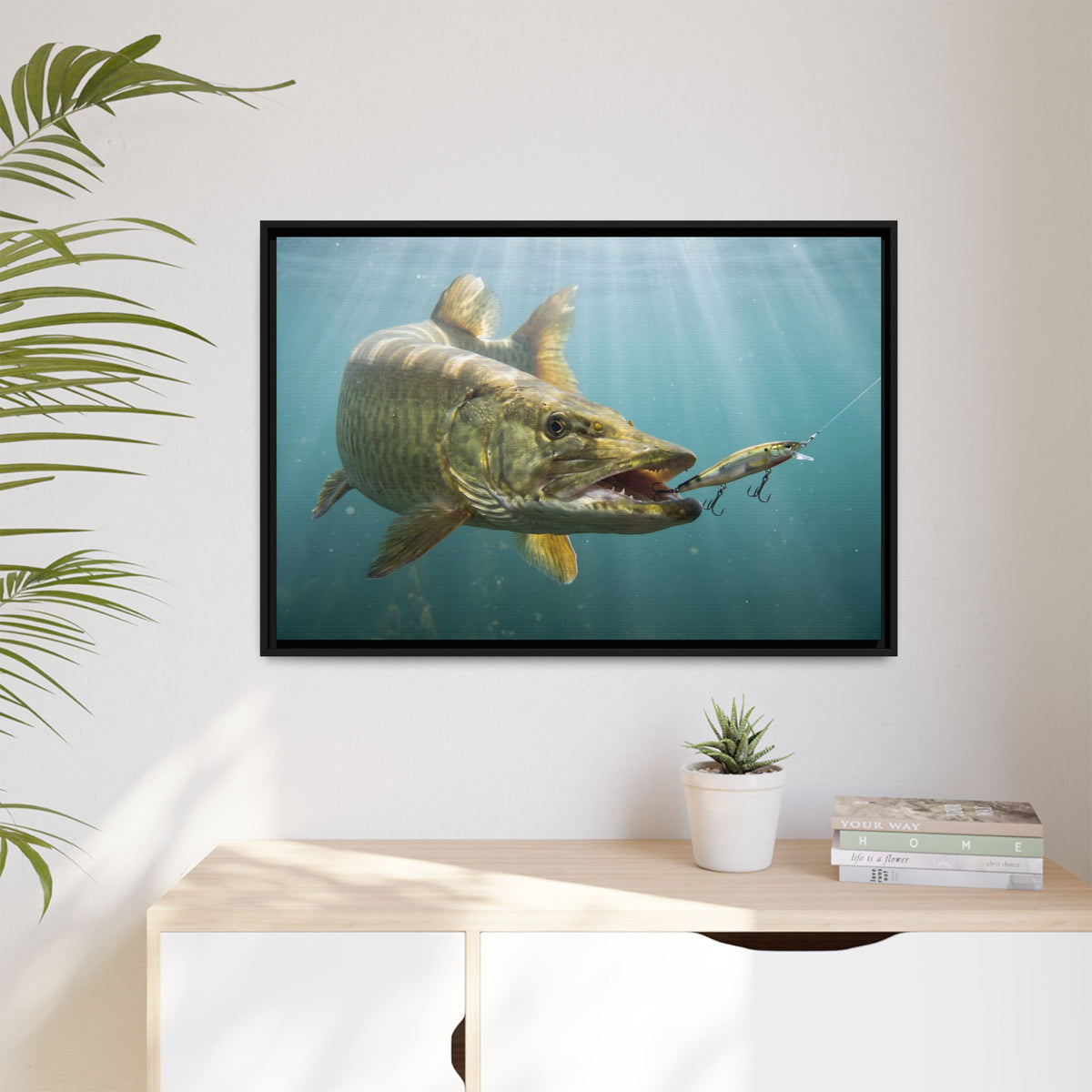 Chrome Jerkbait Strike Muskie framed canvas hanging in a living room