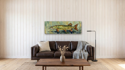 Legends Bold Northwoods Muskie 48x16 canvas over a leather sofa in a modern lake cabin